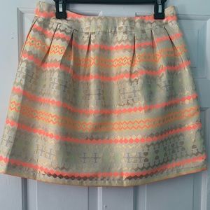 Geometric gold mini skirt